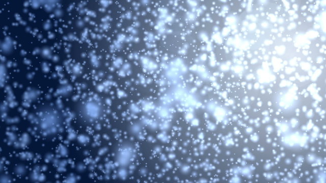 Blue glowing particles moving towards the camera as if in water