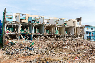 Obraz na płótnie Canvas Demolition of buildings destroyed