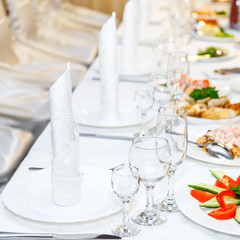 White cutlery on the banquet table