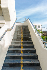 Old stairs of the overpass in the city