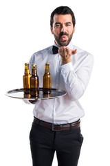 waiter sending a kiss