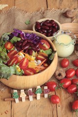 Fresh salad with dressing is a delicious .