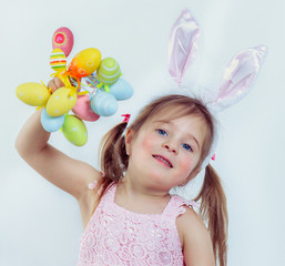 Obraz na płótnie Canvas Kid with Easter eggs