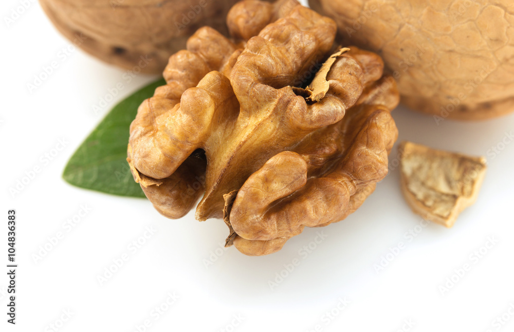 Wall mural walnuts on white background