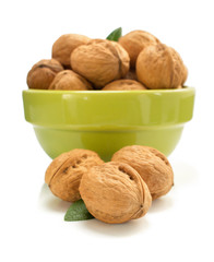 walnuts in bowl on white