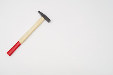 metal hammer with red handle