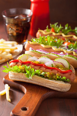 grilled hot dogs with vegetables ketchup mustard