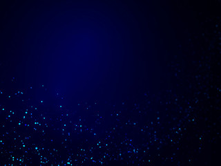 sparkling blue glitter flow in front of a blue background