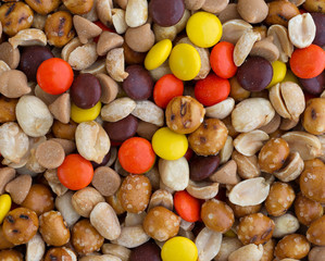 Peanut butter chips and candy trail mix close view.