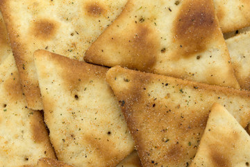 Crispy pita snack crackers close view.