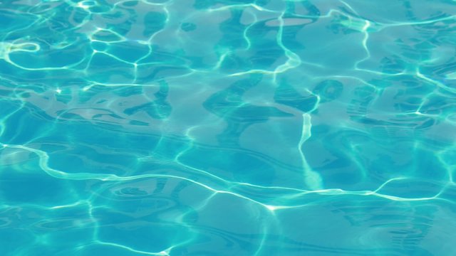 Blue ripped water in swimming pool
