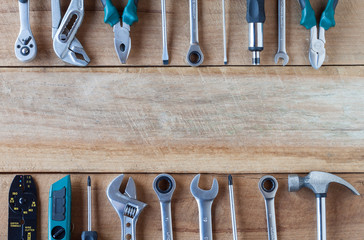 Set of tools on wooden background