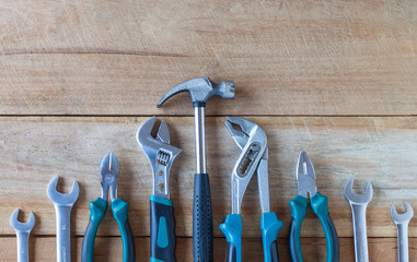 Set of tools on wooden background