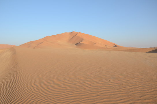 Sand ripples and sand dune hill Oman desert © maurusasdf