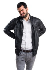Fototapeta premium Man with leather jacket with back pain
