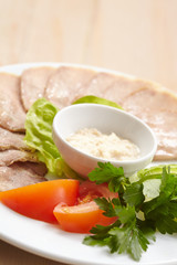 Slices of boiled beef tongue