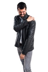 Man with leather jacket with shoulder pain