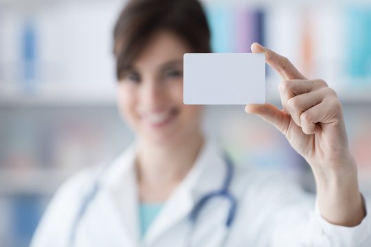 Doctor Holding A Business Card