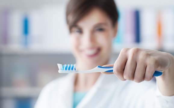 Dentist Holding A Toothbrush