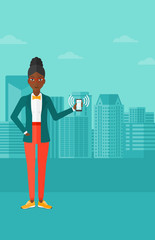 Woman holding ringing telephone.