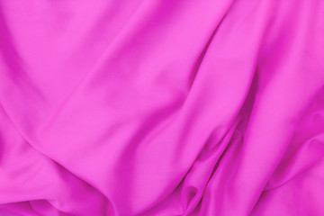 Pink cloth background abstract with soft waves.