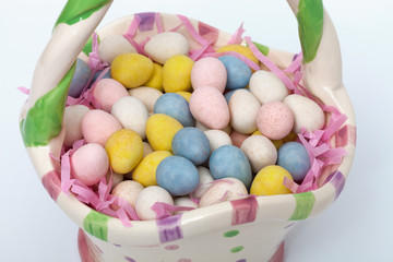 Fototapeta premium Easter eggs in a ceramic Easter basket