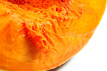 Cut pumpkin close-up on a white background