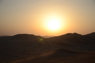 Obraz na płótnie Canvas Sun over sand dunes Shara desert