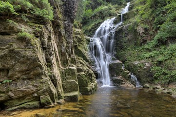 Obraz premium Kamienczyk waterfall in the mountains, Karkonosze, Giant Mountains