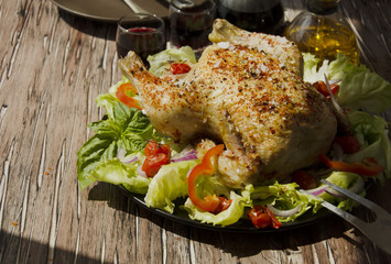  baked chicken with herbs spices ingredients, selective focus