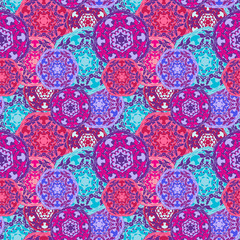 Gypsy seamless pattern of abstract multicolored round mandalas. Ethnic background