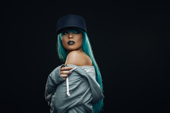 Sexy Hip Hop Woman In Hoodie And Cap