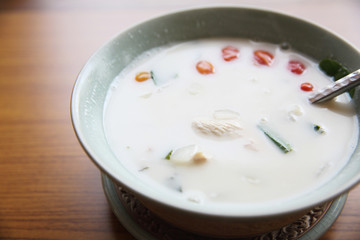 Traditional thai soup Tom Kha Gai - coconut milk with chicken