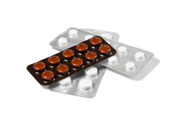 Three packs of pills isolated on white background