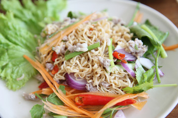 Thai salad with carrot, tomato, glass noodle, celery and pork