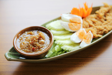 Shrimp paste sauce with crispy fried fish and egg