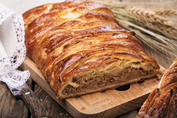 Homemade pie with cabbage close up