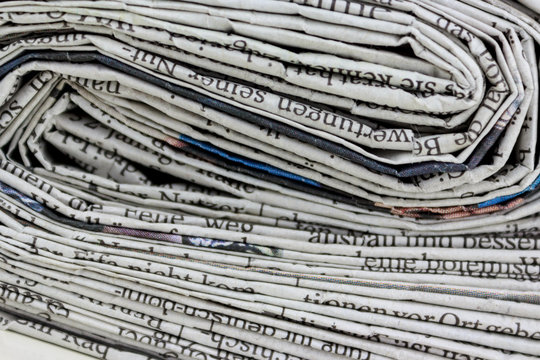 stack of old newspapers, pile of old newspapers