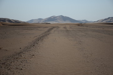 Fototapeta na wymiar perspective view empty plane with stones sand dunes