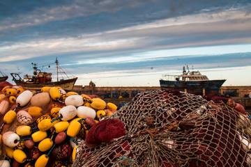Fishing nets, boats and morning sky