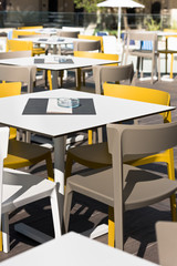 Summer cafe with plastic furniture