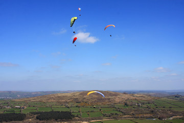 paragliders above Dartmoor