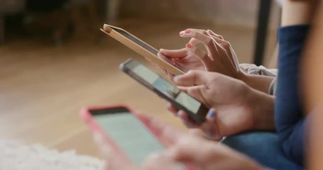 Friends at home using smart phones social media - Powered by Adobe