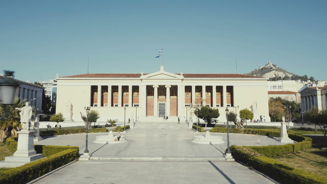 4k Univercity of Athens gimbal tracking shot aerial driving by.