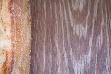 Bread on wooden background 