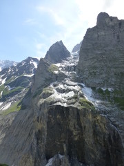 Dramatic sheer rock face and mountain peaks near Grindelwald, Switzerland
