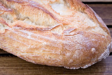Bread on wooden background 