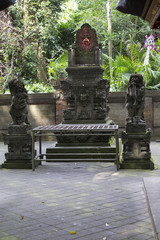 Ancient stone sculpture in the Balinese jungle