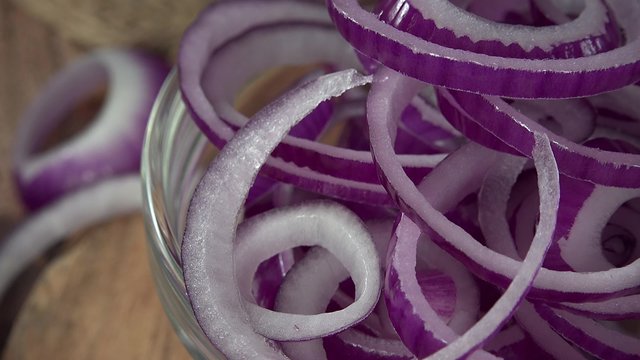 Portion of rotating Red Onion Rings (not loopable, 4K footage)