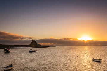 Fototapeta premium Sunrise at Lindisfarne on Holy Island